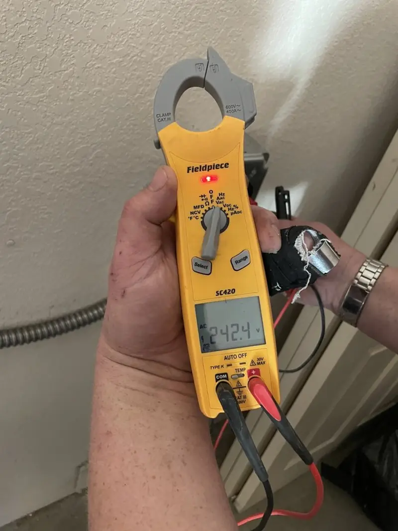 Voltage testing with clamp meter during Circuit Breaker Repair in Sharonville